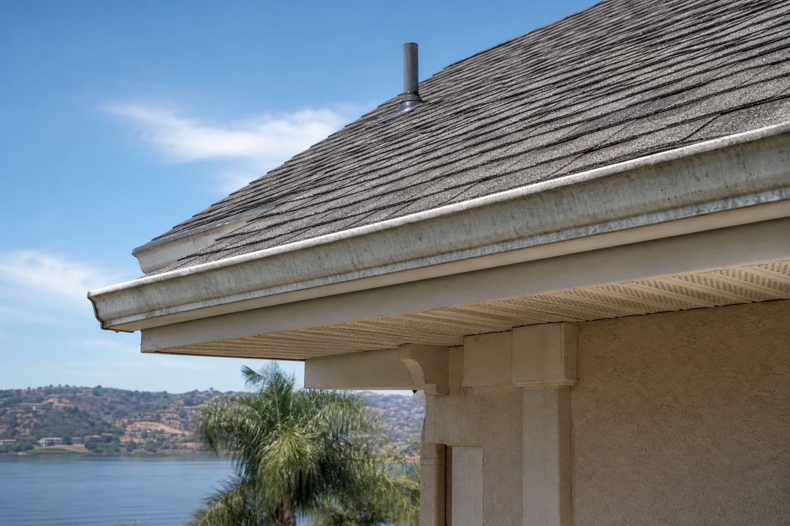 Roof Ventilation Problems in Lakeside Homes: Warning Signs, Energy Costs, and When Gutter Service Should Be Part of the Fix